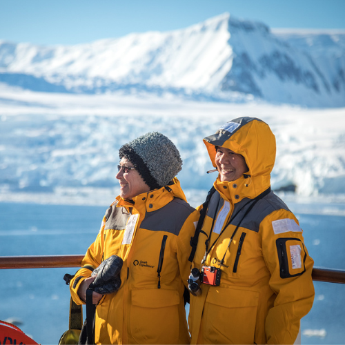 Smiling Pair Humans Antarctica (500 x 500px)